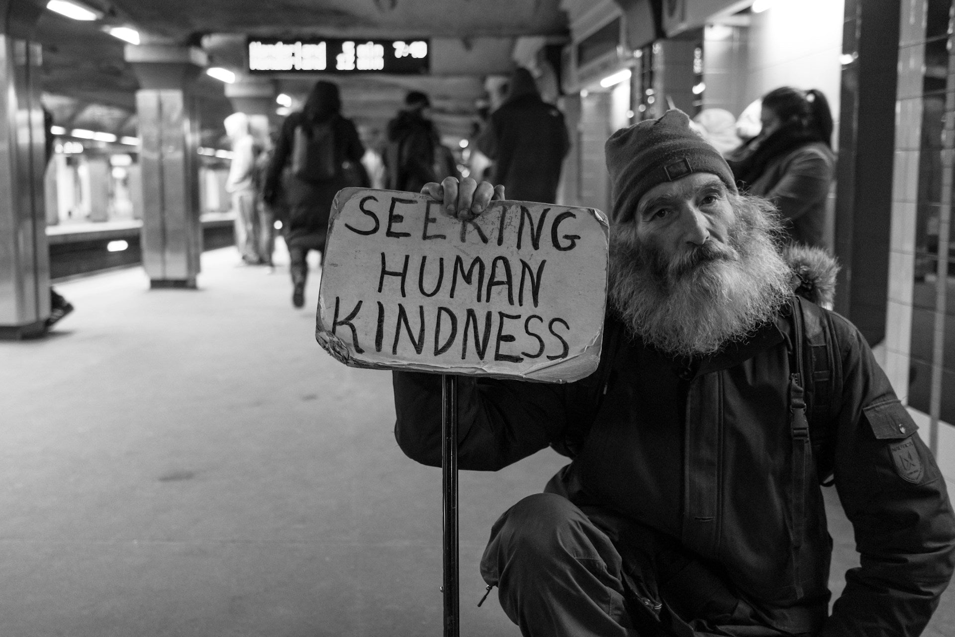 homeless man seeking kindness