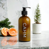 CAHM Thyme, Olive & Bergamot Hand & Body Lotion on display