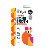 A 500ml carton of Freja Sipping Bone Broth Classic Chicken, featuring a white background with a colorful design of orange, yellow, and pink geometric patterns and a stylized chicken illustration.
