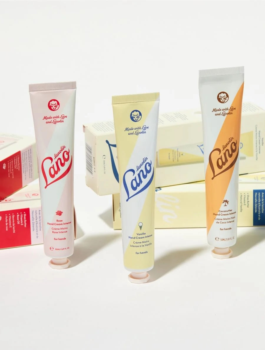 Three Lano hand cream tubes in different colors on a white background