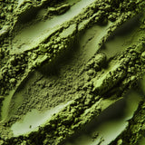 Close-up of green powder with footprints