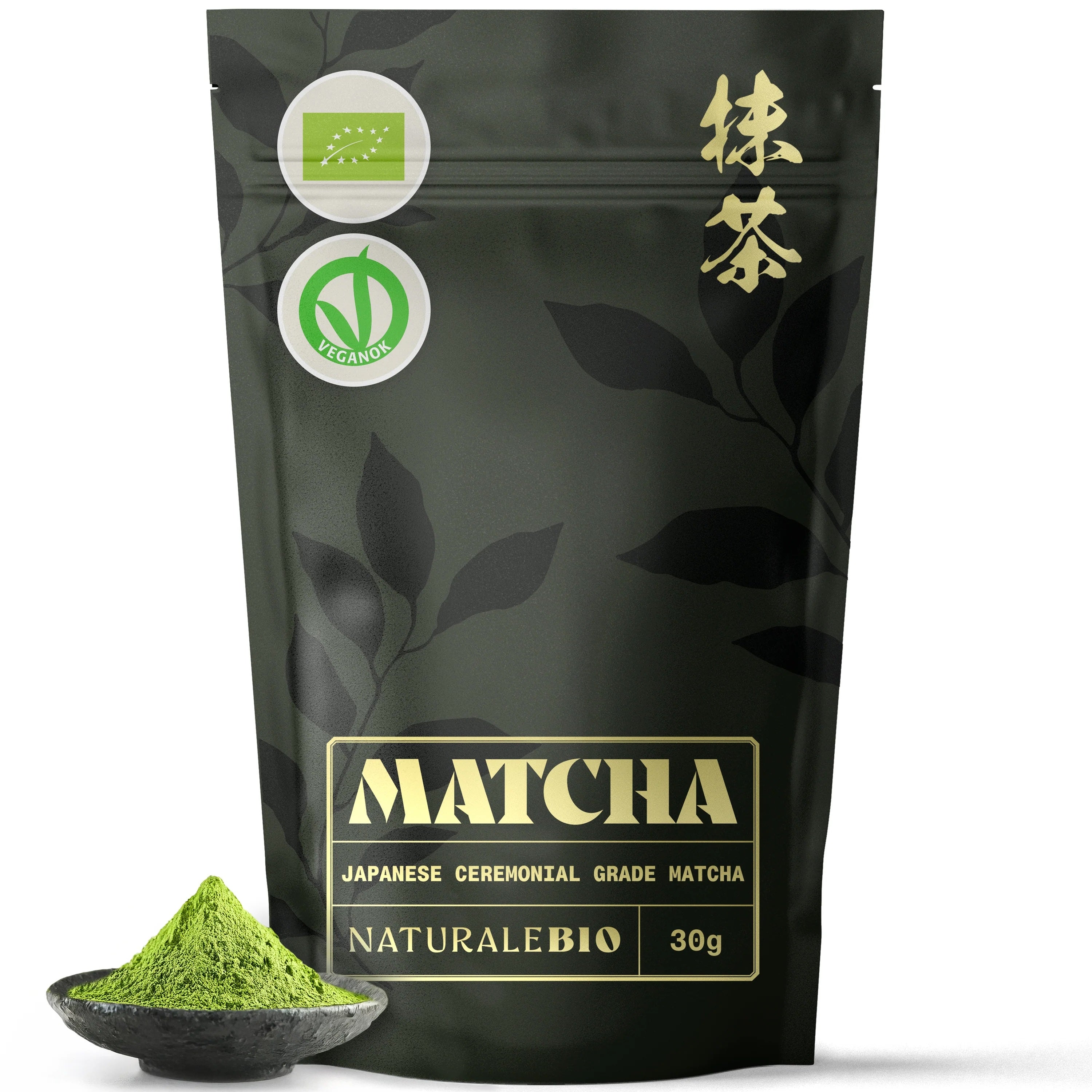 Matcha green tea packaging with a small bowl of matcha powder on a white background