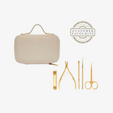 A beige faux-leather manicure kit case with a top handle, shown alongside five gold-colored nail tools (clippers, cuticle press, nail files, scissors, and a spatula) on a white background, with a 'Customer Favourite' badge in the top right.