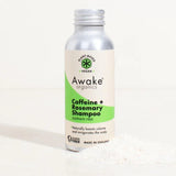 Awake Organics caffeine + rosemary shampoo bottle on a white background