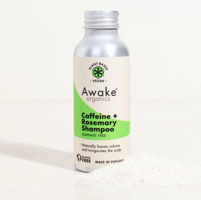 Awake Organics caffeine + rosemary shampoo bottle on a white background