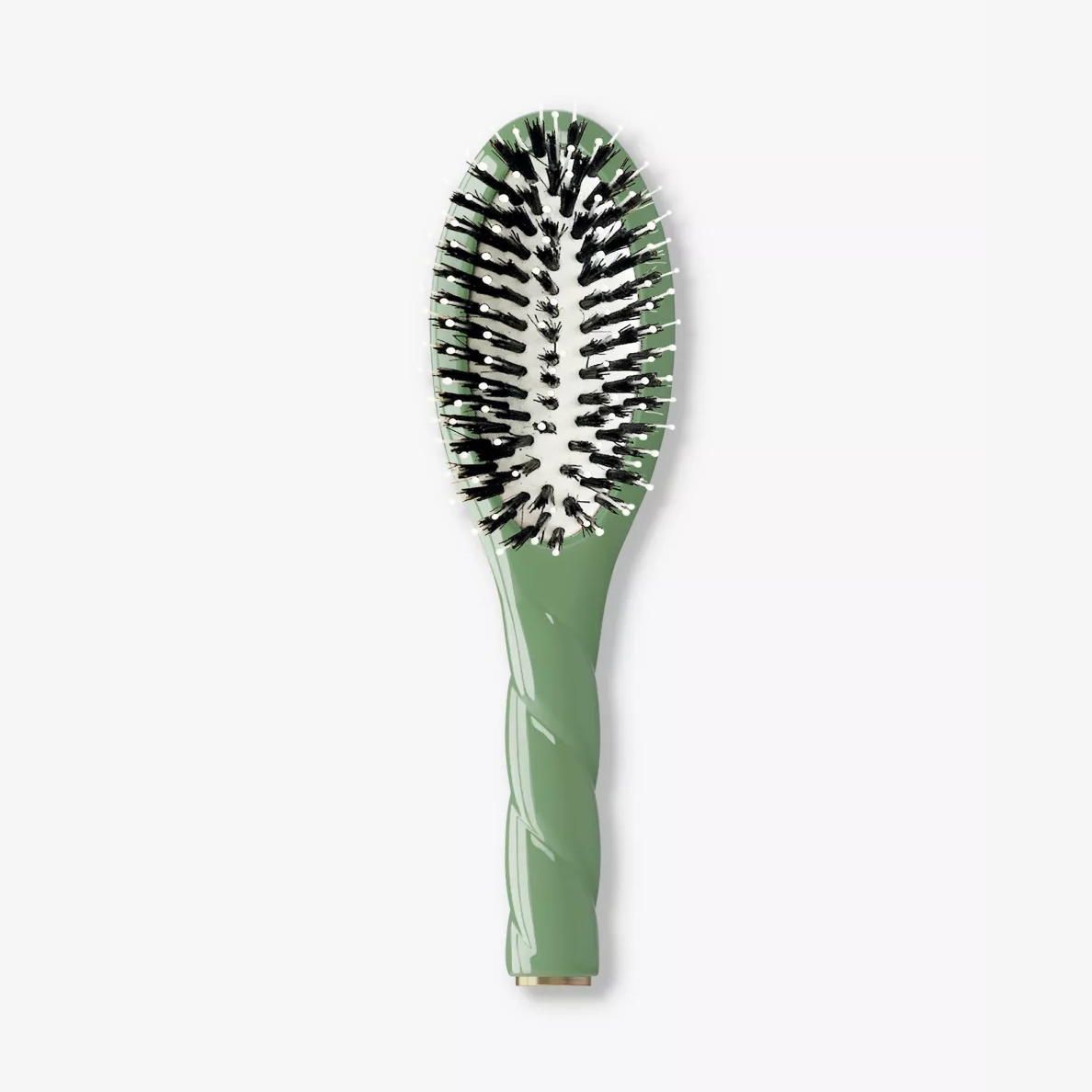 A green hairbrush with black and white bristles, featuring a textured handle and a gold accent at the base, shown on a light gray background.