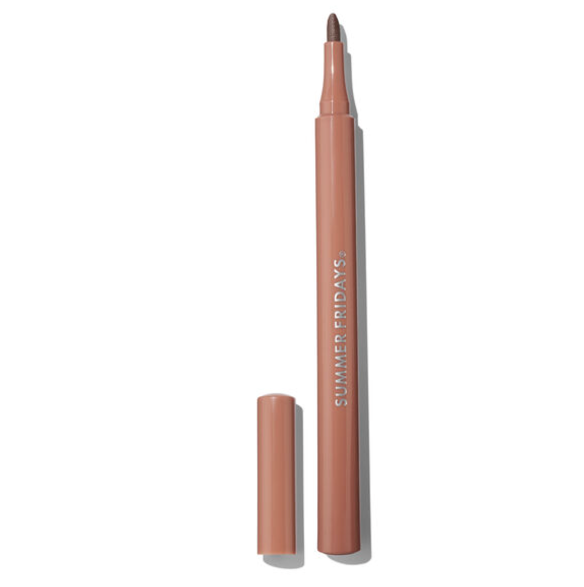 A nude pink cosmetic lip liner pencil with its cap removed, standing vertically next to it on a clean white background. The brand name 'SUMMER FRIDAYS' is printed vertically on the barrel.